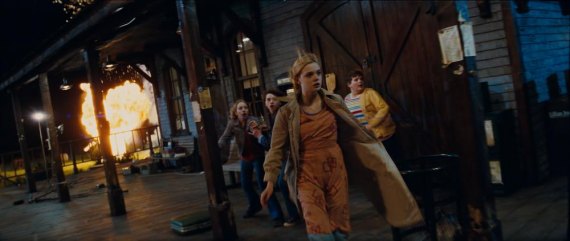 The Making of Super 8: Weirton People Hanging Out on Porches Brought Together by Location Shoot Left to right: Ryan Lee plays Cary, Joel Courtney plays Joe Lamb, Elle Fanning plays Alice Dainard, and Riley Griffiths plays Charles in SUPER 8, from Paramount Pictures. Photo credit: François Duhamel © 2011 Paramount Pictures. All Rights Reserved.